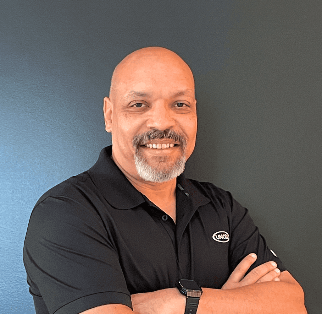 Unox North America President and CEO, Derrick Richardson, smiling at the camera 
